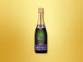 Bouteille de champagne Pommery Brut Royal, le champagne le plus vendu au monde, sur fond doré.