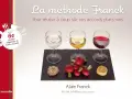Trois verres de vin (blanc, jaune, rouge) et des mets sur une ardoise, illustrant la méthode Franck pour des accords mets et vin réussis.