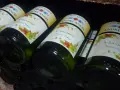 Bouteilles de vin d'Alsace "4 Saisons Pinot Gris" d'André Ancel, prêtes à être dégustées. Un quart de vin pour chaque saison.