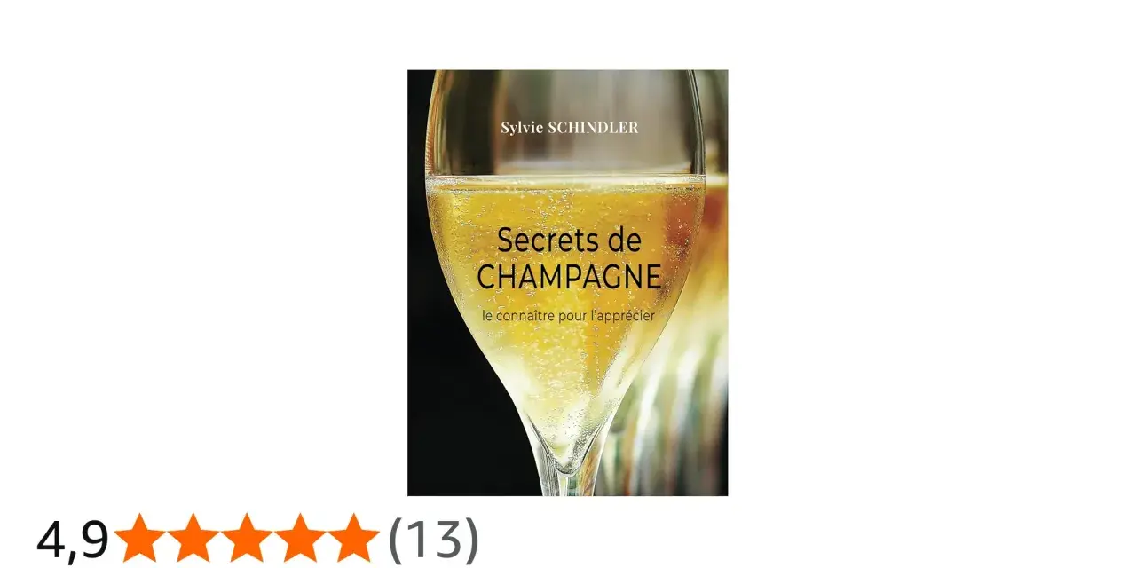 Couverture du livre "Secrets de CHAMPAGNE" de Sylvie Schindler, avec un verre de champagne pétillant. Le livre explore les secrets de ce cépage champenois.