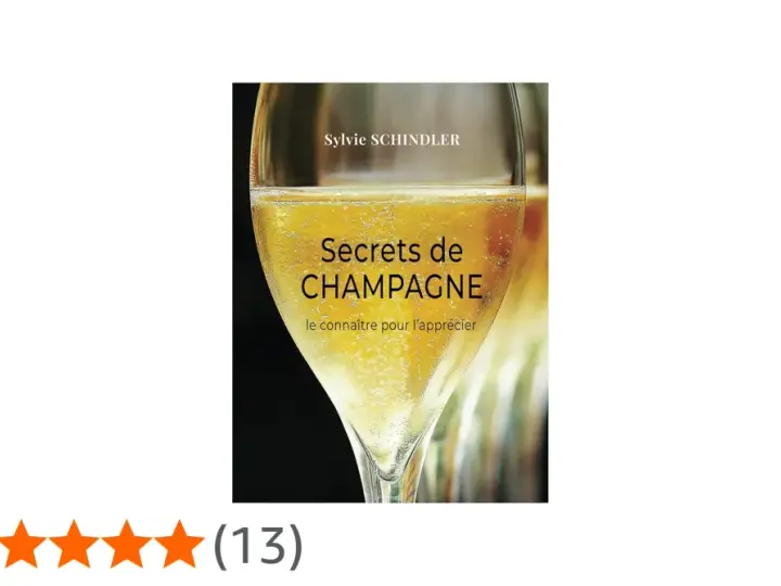 Couverture du livre "Secrets de CHAMPAGNE" de Sylvie Schindler, avec un verre de champagne pétillant. Le livre explore les secrets de ce cépage champenois.