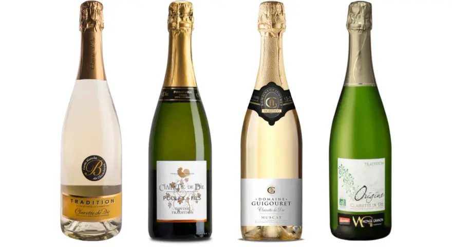 Quatre bouteilles de Clairette de Die, dont une cuvée blanche et trois en bouteilles vertes, prêtes à être dégustées.